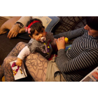 noa with mom on couch and shorts